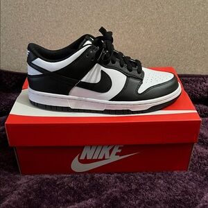 Nike Classic Black and White Low-Tops
Youth size fits women’s 8